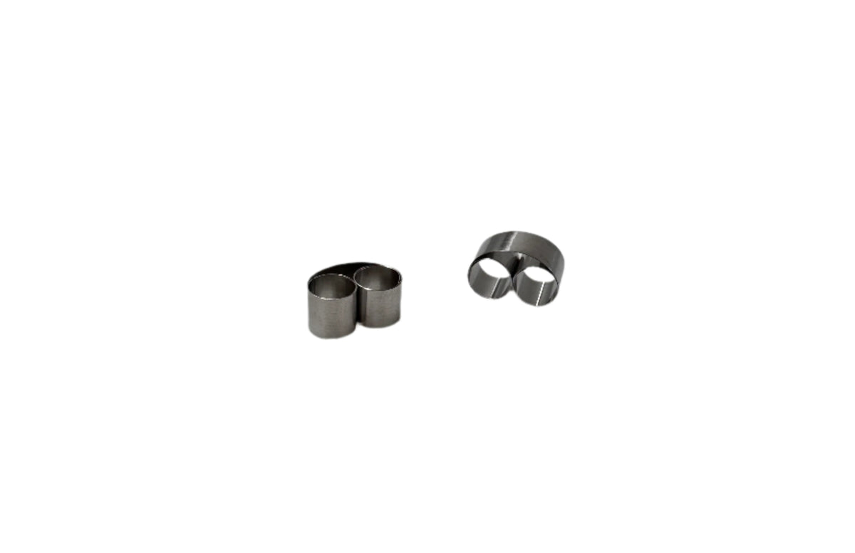 Metal spring specimen clip for secure fastening of metallographic specimens during mounting