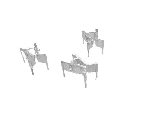 Plastic peg specimen clip for secure fastening of metallographic specimens during mounting